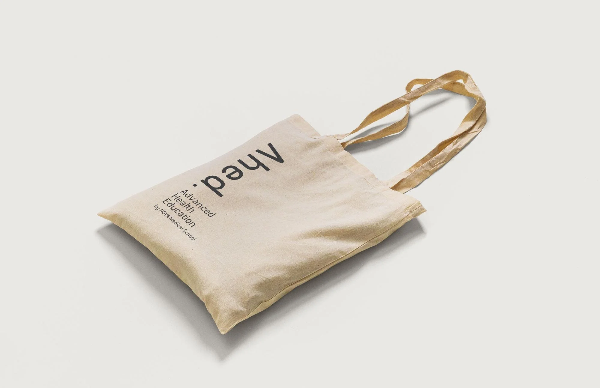 AHED identity applied to a tote bag